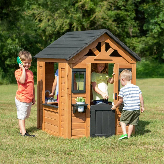 Outdoor Fun Backyard Discovery 116.84cm W x 106.68cm D Outdoor Cedar Playhouse with Kitchen